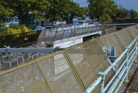 This was &#39;Carlisle Pier Junction&#39;, where the short branch to the pier station diverged away from the main Dublin to Rosslare line, the tracks of which are visible beneath the screening. The short cutting leading to Carlisle Pier (visible in the background) can be seen. Today this area has been covered over.